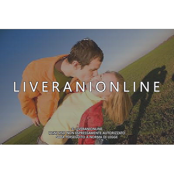 Young love couple kiss COPPIA - FELICITA\' - GOIA - BACIARE AGENZIA ALDO LIVERANI SAS