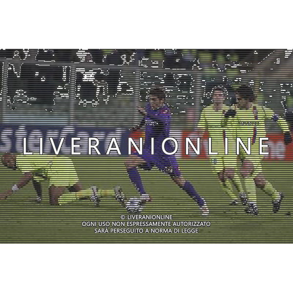 FIORENTINA - OLYMPIQUE LIONE FIRENZE, 25 NOVEMBRE 2OO8 CHAMPIONS LEAGUE GIRONE ELIMINATORIO 2008/2009 NELLA FOTO: ADRIAN MUTU FRAQ JEAN ALAIN BOUMSONG E JUNINHO FOTO AG. A. LIVERANI SAS