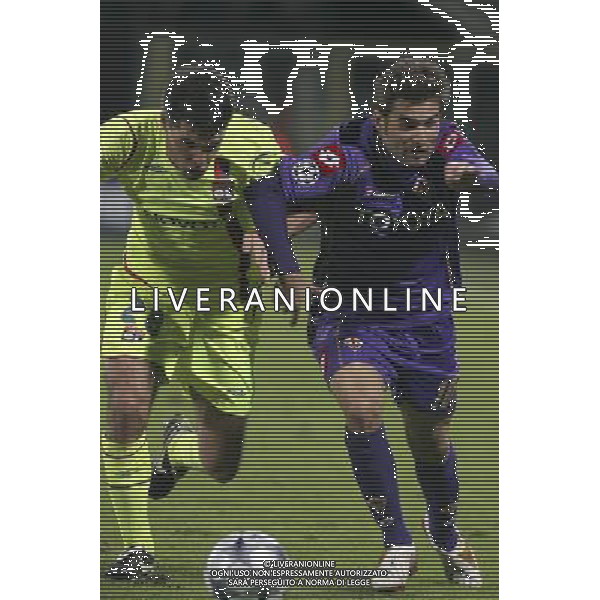FIORENTINA - OLYMPIQUE LIONE FIRENZE, 25 NOVEMBRE 2OO8 CHAMPIONS LEAGUE GIRONE ELIMINATORIO 2008/2009 NELLA FOTO: ADRIAN MUTU E JEREMY TOULALAN FOTO AG. A. LIVERANI SAS