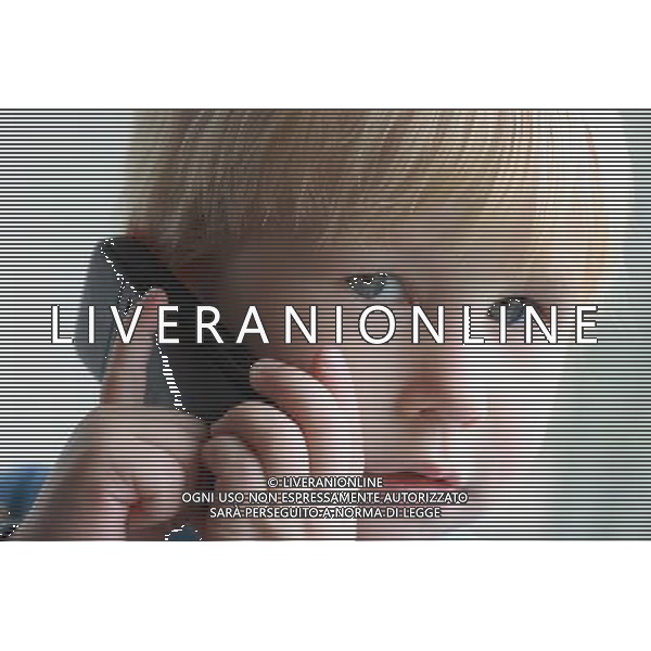 CELLULARE - TELEFONO - BAMBINO - BIMBO - PARLARE AGENZIA ALDO LIVERANI SAS IFC 