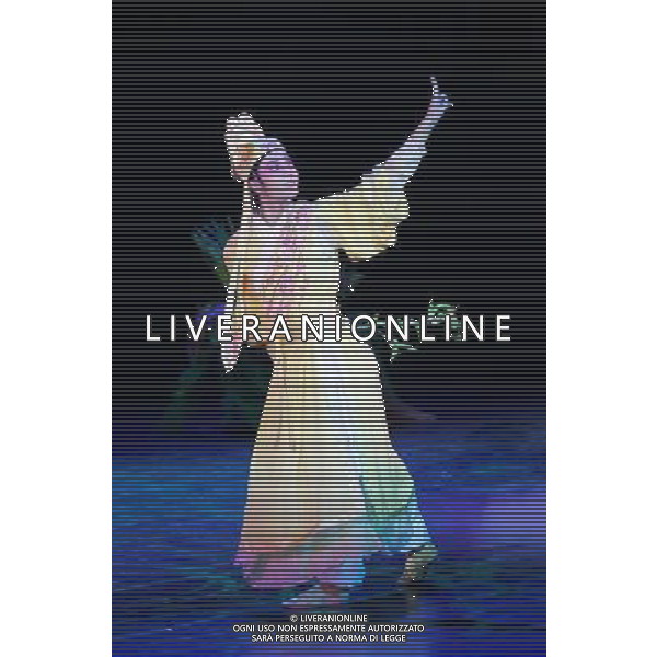 CHENGDU - NOVEMBER 26: Artist Xu Peng performs during the drama Peony Pavilion in Chengdu of southwest China\'s Sichuan province Wednesday, Nov. 26, 2008. The drama Peony Pavilion, a 16th-century tale of love, death and resurrection written by Tang Xianzu (1550-1616), has served as inspiration for a number of artists from all kind of genres, from Kunqu Opera to drama and ballet. Choreographed by Ying Zhiqi, Lu Ling and Wu Ning, this four-act full-length dance revolves around the love between Du Liniang (played by Hu Qinxin) and Liu Mengmei (played by Xu Peng), a love that extends over three lifetimes.(Photo By Qin Wang/ColorChinaPhoto) - AG. ALDO LIVERANI SAS ITALY ONLY