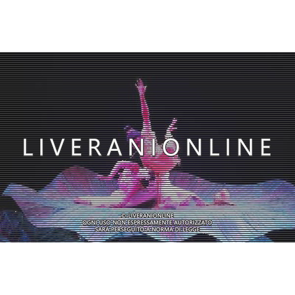 CHENGDU - NOVEMBER 26: Dancers Xu Peng (R) and Hu Qinxin (L) perform during the drama Peony Pavilion in Chengdu of southwest China\'s Sichuan province Wednesday, Nov. 26, 2008. The drama Peony Pavilion, a 16th-century tale of love, death and resurrection written by Tang Xianzu (1550-1616), has served as inspiration for a number of artists from all kind of genres, from Kunqu Opera to drama and ballet. Choreographed by Ying Zhiqi, Lu Ling and Wu Ning, this four-act full-length dance revolves around the love between Du Liniang (played by Hu Qinxin) and Liu Mengmei (played by Xu Peng), a love that extends over three lifetimes.(Photo By Qin Wang/ColorChinaPhoto) - AG. ALDO LIVERANI SAS ITALY ONLY