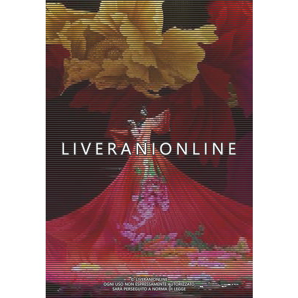 CHENGDU - NOVEMBER 26: Dancers Xu Peng (R) and Hu Qinxin (L) perform during the drama Peony Pavilion in Chengdu of southwest China\'s Sichuan province Wednesday, Nov. 26, 2008. The drama Peony Pavilion, a 16th-century tale of love, death and resurrection written by Tang Xianzu (1550-1616), has served as inspiration for a number of artists from all kind of genres, from Kunqu Opera to drama and ballet. Choreographed by Ying Zhiqi, Lu Ling and Wu Ning, this four-act full-length dance revolves around the love between Du Liniang (played by Hu Qinxin) and Liu Mengmei (played by Xu Peng), a love that extends over three lifetimes.(Photo By Qin Wang/ColorChinaPhoto) - AG. ALDO LIVERANI SAS ITALY ONLY