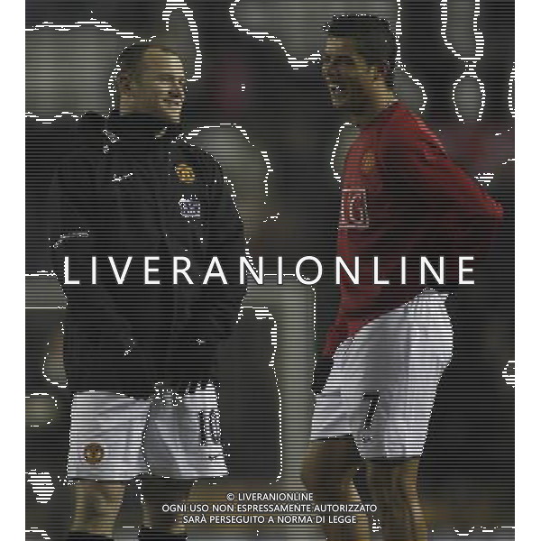 Manchester United\'s Wayne Rooney shares a joke with Cristiano Ronaldo during the warm-up , Derby County Vs Manchester United, Carling Cup Semi Final 1st Leg, Pride Park, Derby, Date 070109, ph.ag ALDO LIVERANI SAS ONLY FOR ITALY