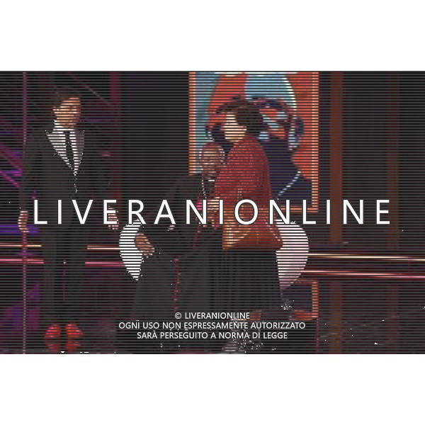 TRASMISSIONE TV: \' CHIAMBRETTI NIGHT\' CON PIERO CHIAMBRETTI OSPITE: Maria Sung, la donna che Milingo ha sposato nel 2001, si precipita sul palco avvicinandosi al monsignore cercando di farlo andare via. La signora ci ha riprovato una seconda volta e a Chiambretti urla: \'Vergogna\' © Antonio Sorano - ag. Aldo Liverani sas 