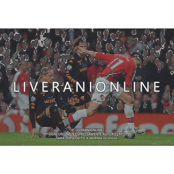 Champions League 2008/2009 Ottavi di Finale - Andata Londra - 24.02.2009 Arsenal-Roma Nella Foto:FALLO DEL RIGORE DI MEXES SU VAN PERSIE /Ph.Vitez-Ag. Aldo Liverani