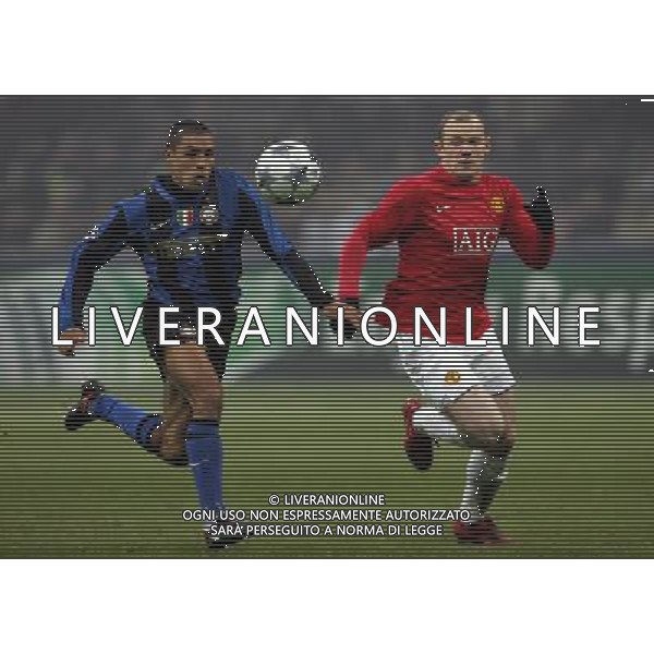 Inter - Manchester United 24/02/2009 Ottavi di Champions League 2008/2009 Nella foto ivan cordoba e rooney wayne Foto Luzzani/Ag. Aldo Liverani