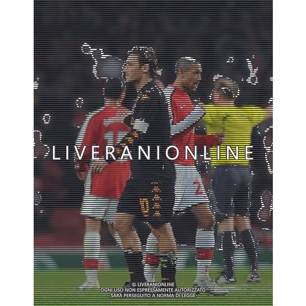 Champions League 2008/2009 Ottavi di Finale - Andata Londra - 24.02.2009 Arsenal-Roma Nella Foto:ESULTANZA CLICHY E DELUSIONE TOTTI AL FISCHIO FINALE /Ph.Vitez-Ag. Aldo Liverani