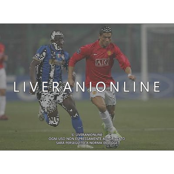 Milano 24-02-2009 Champions League 2008/09 Inter-Manchester United 0:0 nella foto cristiano ronaldo e sulley muntari ph marco luzzani/ag aldo liverani s.a.s.