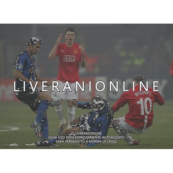 Milano 24-02-2009 Champions League 2008/09 Inter-Manchester United 0:0 nella foto ivan ramiro cordoba, wayne rooney e dejan stankovic ph marco luzzani/ag aldo liverani s.a.s.