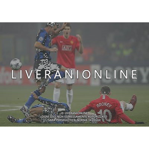 Milano 24-02-2009 Champions League 2008/09 Inter-Manchester United 0:0 nella foto ivan ramiro cordoba, wayne rooney e dejan stankovic ph marco luzzani/ag aldo liverani s.a.s.