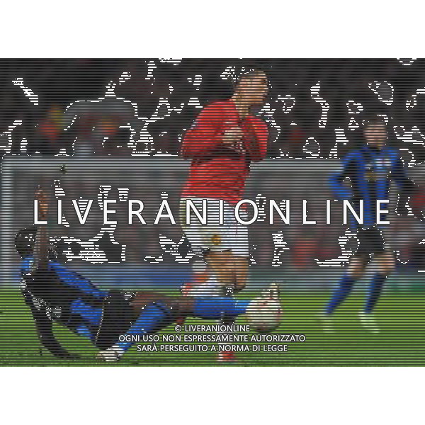 Champions League 2008/2009 Ottavi di Finale - Ritorno Manchester - 11.03.2009 Manchester United-Inter Nella Foto:MUNTARI SULLEY-RONALDO CRISTIANO /Ph.Vitez-Ag. Aldo Liverani