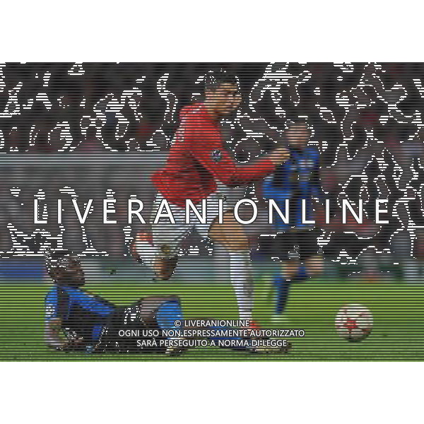 Champions League 2008/2009 Ottavi di Finale - Ritorno Manchester - 11.03.2009 Manchester United-Inter Nella Foto:RONALDO CRISTIANO-MUNTARI SULLEY /Ph.Vitez-Ag. Aldo Liverani