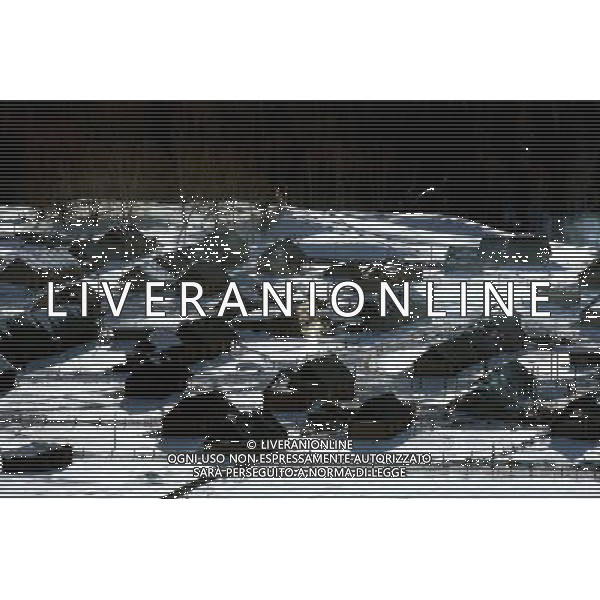 KANAS - MARCH 6: A view of the snow-covered frame houses in Hemu village at the Kanas nature reserve in Xinjiang Uygur Autonomous Region, China on Friday, March 6, 2009. Sharing borders with Kazakhstan, Russia and Mongolia, Kanas Nature Reserve boasts a beautiful natural ecosystem formed by lakes, rivers, glaciers, forests, and grasslands. Hemu Village, ranked by China National Geography as one of the six most beautiful villages in China, is one of the three residences of the Tuva Mongol in the country. The Tuva Mongol of Hemu Village lives in frame houses half-buried in the ground to resist the chillness of winter. They believe in Buddhism and have well preserved the traditional beliefs of their tribe.(Photo By Zhou You/ColorChinaPhoto) - AG. ALDO LIVERANI SAS ITALY ONLY