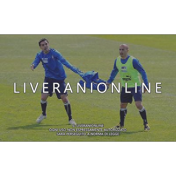 Raduno Nazionale Italiana a Coverciano Fiesole(FI) - 25.03.2009 Allenamento Nella Foto:CANNAVARO FABIO SFILA LA MAGLIA A QUAGLIARELLA FABIO /Ph.Vitez-Ag. Aldo Liverani