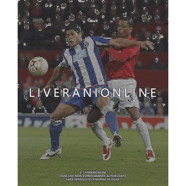 Manchester United\'s Patrice Evra in action with FC Porto\'s Hulk, Manchester United Vs FC Porto, European Champion Clubs Cup 1/4 final 1st Leg, Old Trafford, Manchester, Date 070409 PH.AGENZIA ALDO LIVERANI S A S ONLY ITALY 