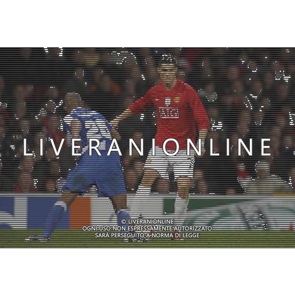 Manchester United\'s Cristiano Ronaldo in action with FC Porto\'s Fernando, Manchester United Vs FC Porto, European Champion Clubs Cup 1/4 final 1st Leg, Old Trafford, Manchester, Date 070409 PH.AGENZIA ALDO LIVERANI S A S ONLY ITALY 