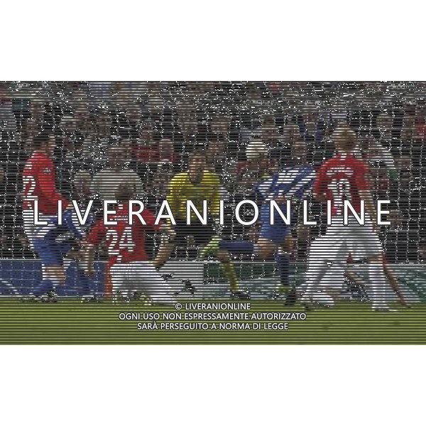 Manchester United\'s Edwin Van Der Sar saves from Cristian Rodriguez, Manchester United Vs FC Porto, European Champion Clubs Cup 1/4 final 1st Leg, Old Trafford, Manchester PH.AGENZIA ALDO LIVERANI S A S ONLY ITALY 