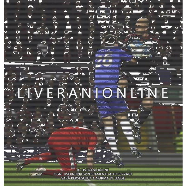 John Terry, the Captain of Chelsea fouls Liverpool\'s Pepe Reina and will get booked : Liverpool fc vs Chelsea fc at Anfield Stadium in Liverpool for the 1st Leg of UEFA Champions League Q.o.F. on 08/04/2009. ph.agenzia aldo liverani sas only for italy