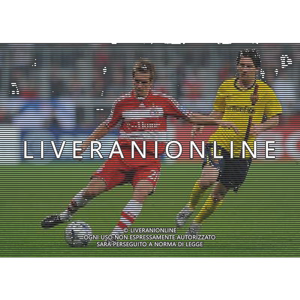 Champions League 2008/2009 Quarti di Finale - Ritorno Monaco - 14.04.2009 Bayern Monaco-Barcellona Nella Foto:LAHM-MESSI lionel /Ph.Vitez-Ag. Aldo Liverani