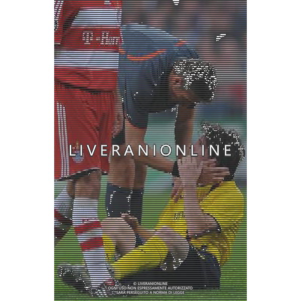 Champions League 2008/2009 Quarti di Finale - Ritorno Monaco - 14.04.2009 Bayern Monaco-Barcellona Nella Foto:arbitro roberto ROSETTI con lionel MESSI /Ph.Vitez-Ag. Aldo Liverani