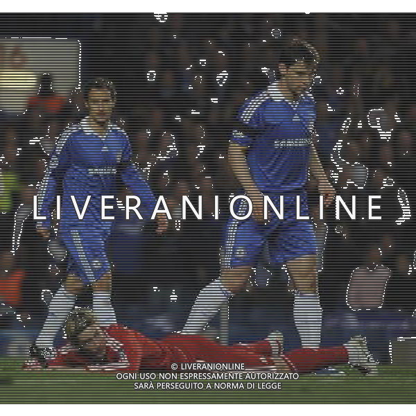 14/4/2009.STAMFORD BRIDGE.CHAMPIONS LEAGUE. QUARTER FINAL 2ND LEG.CHELSEA V LIVERPOOL.TORRES IS GROUNDED.PIC DAVE SHOPLAND 14/4/2009.STAMFORD BRIDGE.CHAMPIONS LEAGUE. QUARTER FINAL 2ND LEG.CHELSEA V LIVERPOOL.TORRES IS GROUNDED PH.ALDO LIVERANI SAS ONLY ITALY