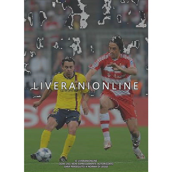 Champions League 2008/2009 Quarti di Finale - Ritorno Monaco - 14.04.2009 Bayern Monaco-Barcellona Nella Foto:XAVI HERNANDEZ-TONI LUCA /Ph.Vitez-Ag. Aldo Liverani