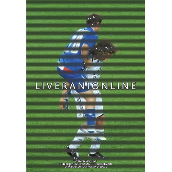 TORINO 18/5/2009 PARTITA DEL CUORE A FAVORE DEI TERREMOTATI D\' ABRUZZO NAZIONALE CANTANTI VS AMICI DI ALEX DEL PIERO NELLA FOTO PAOLO MENEGUZZI E LAPO ELKANN FOTO ROMANO/AG ALDO LIVERANI