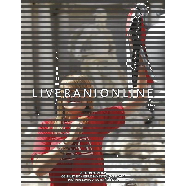 A Manchester United fan holds a plastic trophy of the Champions cup in front of the Fontana de Trevi in central Rome, 26 May 2009. FC Barcelona and Manchester United will face each other in tomorrow‰s Champions League final in the Stadio Olimpico in Rome. © UFT - Talking Sport/Photoshot - Ag. Ag. Aldo Liverani sas ITALY ONLY