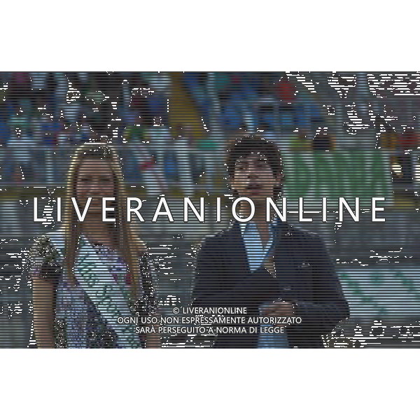 BRESCIA 24/06/2009 CALCIO WORLD CUP 2009 PADANIA-KURDISTAN NELLA FOTO Renzo Bossi e Miss Padania durante inno padano PH AG.ALDO LIVERANI SAS