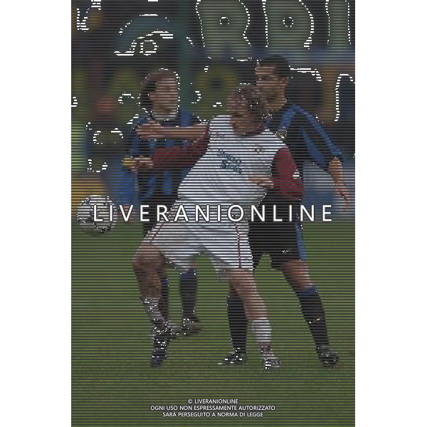 Inter - Reggina Coppa Italia Tim Cup 04/12/2003 nella foto Davide Baiocco e Lamouchi Sabri* foto Marco Luzzani/Agenzia Aldo liverani