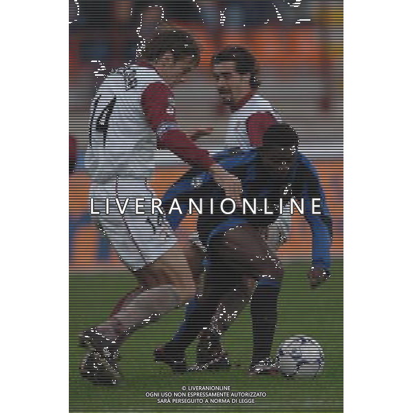 Inter - Reggina Coppa Italia Tim Cup 04/12/2003 nella foto Ivan Franceschini e Martins Obafemi* foto Marco Luzzani/Agenzia Aldo liverani