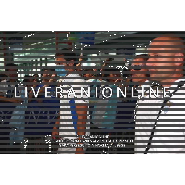 Arrivo dei giocatori della squadra della lazio all\'aeroporto di Pechino per la Supercoppa Italiana Stefan Radu con la mascherina - Lazio players arrive in Beijing, China, Sunday, Aug. 2, 2009. Scudetto holders Inter and Coppa Italia winners Lazio will compete in the Italian Super Cup in Beijing on August 8.(Photo By Zheng Ze/ColorChinaPhoto) /Agenzia Aldo Liverani Sas - ITALY ONLY -