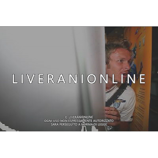 Arrivo dei giocatori della squadra della lazio all\'aeroporto di Pechino per la Supercoppa Italiana Roberto Baronio - Lazio\'s player looks on during his arrival in Beijing, China, Sunday, Aug. 2, 2009. Scudetto holders Inter and Coppa Italia winners Lazio will compete in the Italian Super Cup in Beijing on August 8.(Photo By Zheng Ze/ColorChinaPhoto) /Agenzia Aldo Liverani Sas - ITALY ONLY -