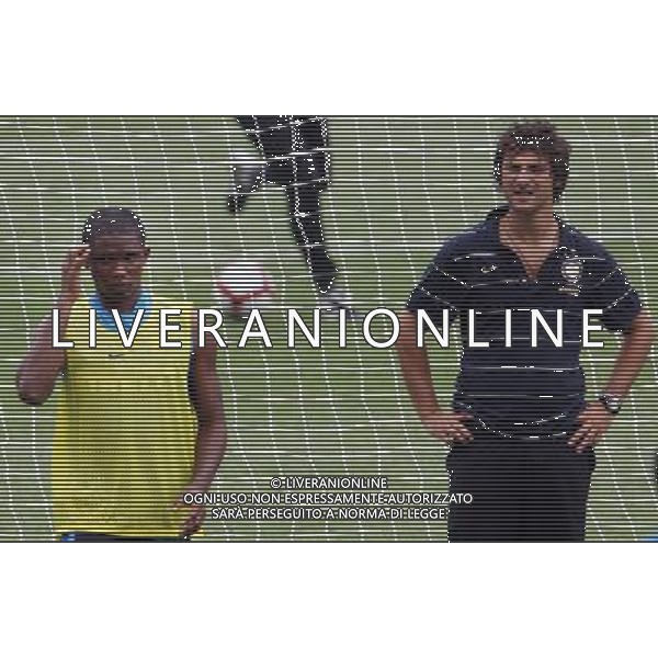 Allenamento dell\'Inter a Pechino per la Supercoppa Italiana 04/08/2009 Inter\'s Samuel Eto\'o (L) attends a training session for the upcoming Italian Super Cup in Beijing, China on Tuesday, Aug. 4, 2009. Scudetto holders Inter and Coppa Italia winners Lazio will compete in the Italian Super Cup in Beijing on August 8.(Photo By Qiu Feng/ColorChinaPhoto) /Agenzia Aldo Liverani Sas - ITALY ONLY -