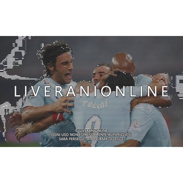 (090808) -- BEIJING, Aug. 8, 2009 -- The Lazio team celebrates a goal during the Italian Super Cup soccer match against Inter Milan at the National Stadium in Beijing, capital of China, Aug. 8, 2009. Lazio won the match 2-1. Fei Maohua) (txy/) Inter - Lazio Supercoppa Italiana a Pechino 08/08/2009 - abbracci esultanza /Agenzia Aldo Liverani Sas - ITALY ONLY -