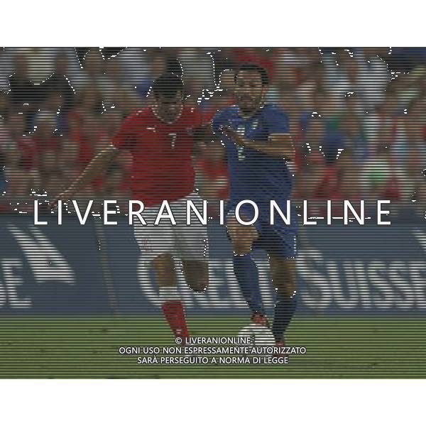 Svizzera - Italia partita amichevole della Nazionale Italiana a Basilea 12/08/2009 nella foto gianluca zambrotta e tranquillo barnetta ©Luzzani/Agenzia Aldo Liverani Sas