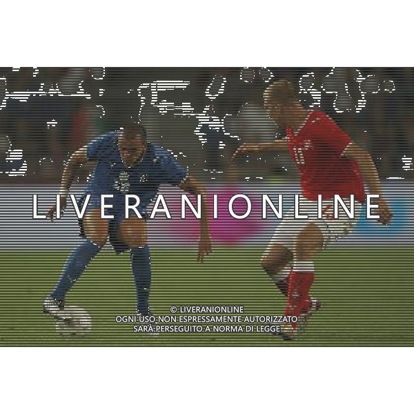 Svizzera - Italia partita amichevole della Nazionale Italiana a Basilea 12/08/2009 nella foto simone pepe e stephane grichting ©Luzzani/Agenzia Aldo Liverani Sas