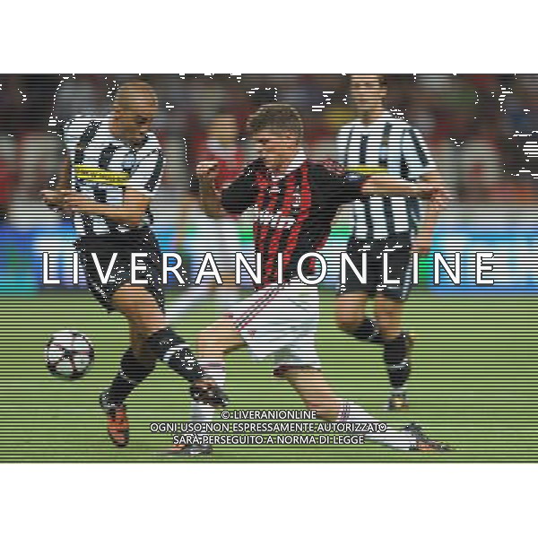 Trofeo Berlusoni Milano - 17.08.2009 Milan-Juventus Nella Foto:HUNTELAAR-CANNAVARO fabio /Ph.Vitez-Ag. Aldo Liverani