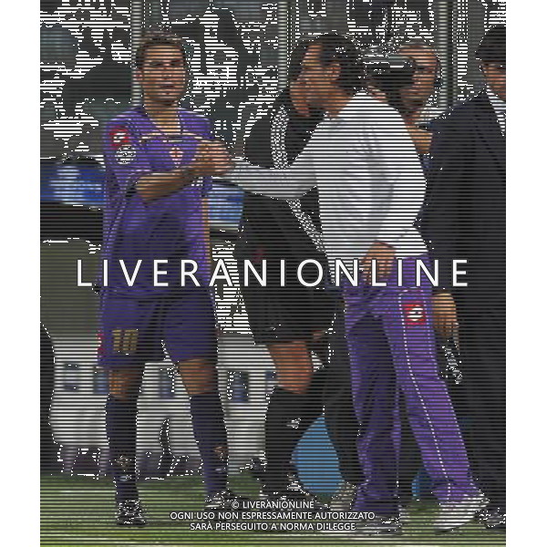 Champions League 2009/2010 Turno Preliminare Ritorno Firenze - 26.08.2009 Fiorentina-Sporting Lisbona Nella Foto:STRETTA DI MANO TRA CESARE PRANDELLI E ADRIAN MUTU /Ph.Vitez-Ag. Aldo Liverani