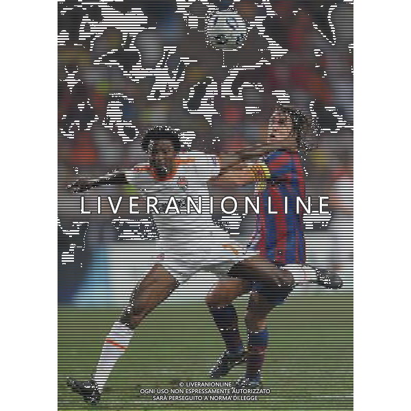 Supercoppa Europea 2009 Montecarlo - 28.08.2009 FC Barcellona-FC Shakhtar Donetsk Nella Foto:AGHAHOWA JULIUS-PUYOL CARLES /Ph.Vitez-Ag. Aldo Liverani