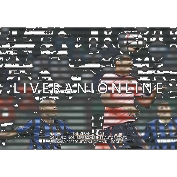 Inter - Barcellona Champions League 16/09/2009 nella foto Thierry henry e maicon ©luzzani/Agenzia Aldo Liverani Sas
