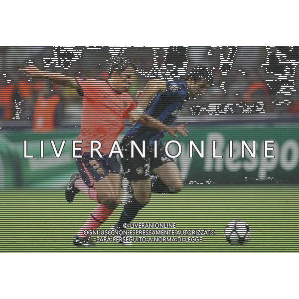 Inter - Barcellona Champions League 16/09/2009 nella foto puyol e milito diego ©luzzani/Agenzia Aldo Liverani Sas
