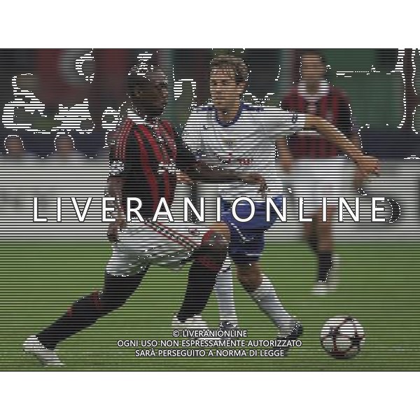 Milan - Zurigo Champions League 30/09/2009 nella foto clarence seedorf e aegerter ©luzzani/Agenzia Aldo Liverani Sas