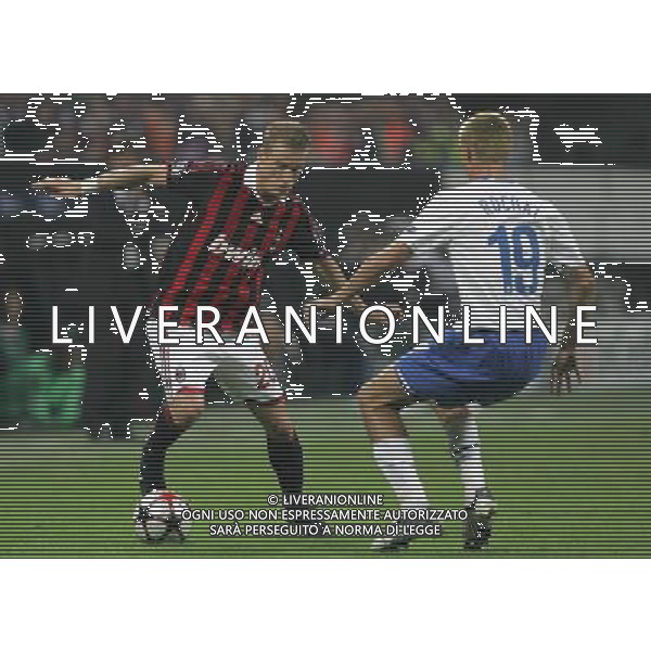 Milano 30-09-2009 Champions League 2009/10 milan-zurigo 0:1 nella foto ignazio abate e alain rochat ph marco luzzani/ag aldo liverani s.a.s.