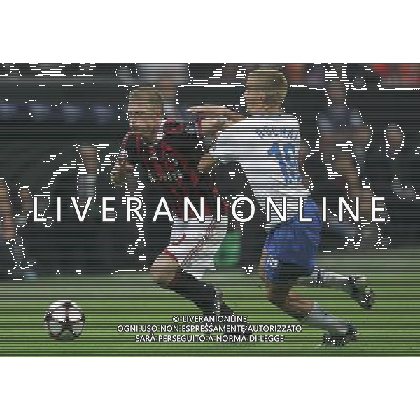 Milano 30-09-2009 Champions League 2009/10 milan-zurigo 0:1 nella foto ignazio abate e alain rochat ph marco luzzani/ag aldo liverani s.a.s.
