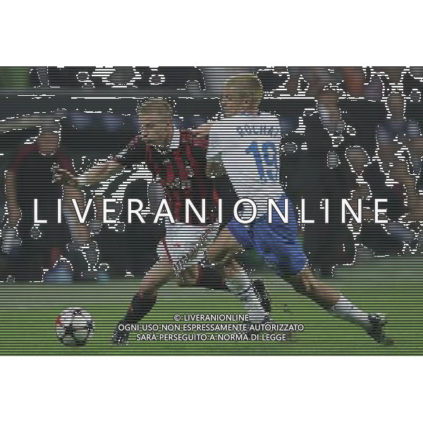 Milano 30-09-2009 Champions League 2009/10 milan-zurigo 0:1 nella foto ignazio abate e alain rochat ph marco luzzani/ag aldo liverani s.a.s.