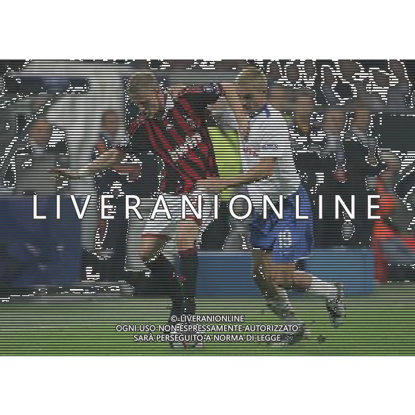 Milano 30-09-2009 Champions League 2009/10 milan-zurigo 0:1 nella foto ignazio abate e alain rochat ph marco luzzani/ag aldo liverani s.a.s.