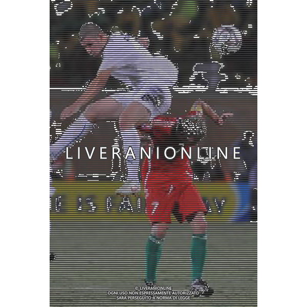 (091009) -- SUEZ, Oct. 9, 2009 -- Italy\'s Marco Calderoni (L) vies with Hungary\'s Vladimir Koman during a quarter-final match at the 17th FIFA U-20 World Cup in Egyptian port city of Suez, Oct. 9, 2009. Hungary won the match 3-2 to step in the top 4. (Xinua/Yin Bogu) (gxr) - Xinhua - Photoshot - Ag. Aldo Liverani sas ITALY ONLY CALCIO: Mondiale under 20, Italia-Ungheria 2-3 quarti di finale del Mondiale di categoria che si sta svolgendo in Egitto