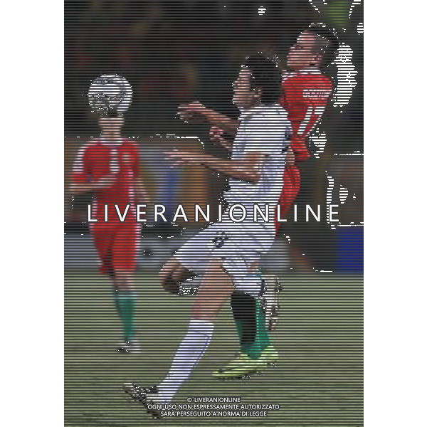 (091009) -- SUEZ, Oct. 9, 2009 -- Italy\'s Francesco Bini (in white) vies with Hungary\'s Andras Gosztonyi during a quarter-final match at the 17th FIFA U-20 World Cup in Suez, Egypt, Oct. 9, 2009. (Yin Bogu) (gxr) - Xinhua - Photoshot - Ag. Aldo Liverani sas ITALY ONLY CALCIO: Mondiale under 20, Italia-Ungheria 2-3 quarti di finale del Mondiale di categoria che si sta svolgendo in Egitto